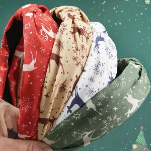 Set of 4 festive Christmas fabric headbands with colorful reindeer and snowflake prints