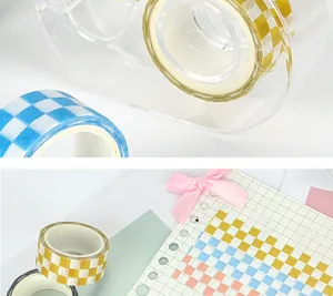 Detailed view of colorful checkerboard washi tapes with dispenser and planner journal setup.