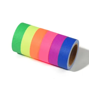 Colorful neon fluorescent cloth tape for stage decoration, glowing UV adhesive tape roll.