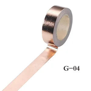 Rose gold metallic washi tape, decorative adhesive masking tape for journaling and DIY crafts.