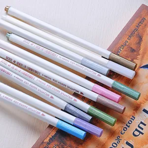 Set of colorful dual-tip art markers with white barrels and assorted vibrant caps.