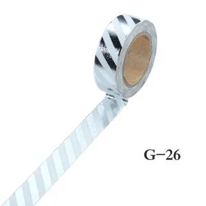 Decorative silver foil washi tape with stylish white and shiny striped pattern for journaling.