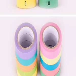 Close up of colorful washi tape rolls for DIY journal decoration, minimalist aesthetic style.