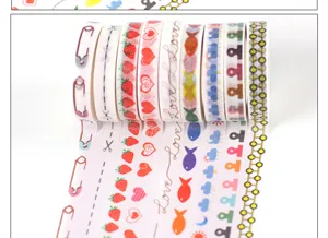 Cute decorative washi tape set with strawberry, heart, and pattern designs for journaling.