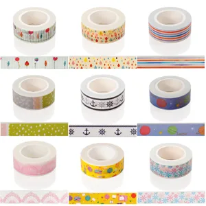 Decorative washi tape sets with colorful patterns, cute planner stickers for DIY craft stationery.