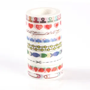 Colorful washi tape set for journaling and DIY crafts. Cute decorative masking tapes with various patterns like hearts and fruit.