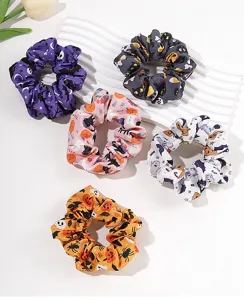 Set di cinque elastici per capelli Halloween con motivi zucca, fantasma e teschio.