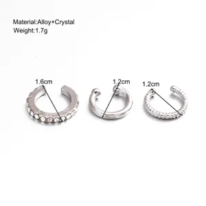 Detailed view of three silver-tone ear cuffs featuring crystal accents and dimensions
