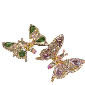 Funkelnde bewegliche Strass Schmetterling Haarspangen in Violett und Grün für Kinder.