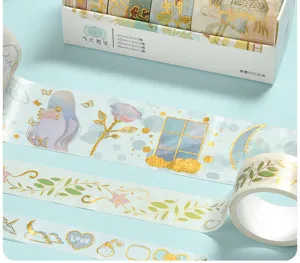 Decorative washi tape set with metallic gold foil, perfect for journaling and stationery crafts.