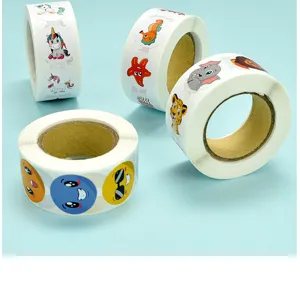 Close-up detail view of cute cartoon animal and emoji sticker rolls for crafts journaling.