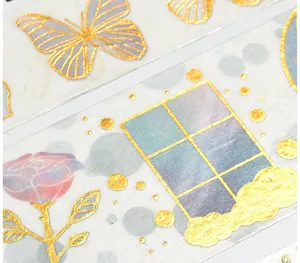 Gold foil washi tape detail showing exquisite golden patterns like butterflies and roses.