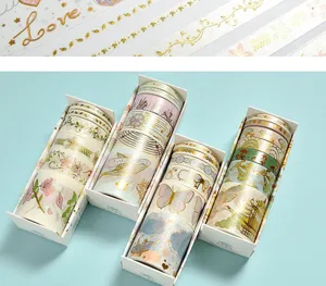 Detailed view of creative gold stamping washi tape set featuring various floral and ocean designs.