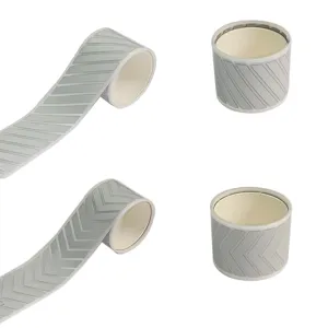 DIY silver reflective heat transfer tape roll for garment decoration and safety use.