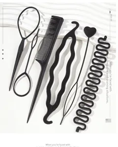 Close-up detail of a 6-piece black professional hair styling and braiding tool set