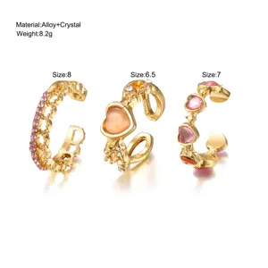 Detail view of heart and thorn rings with material and size specifications