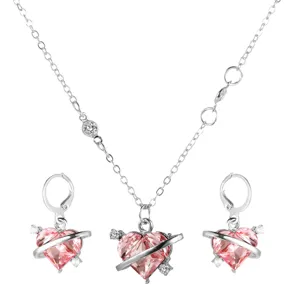 Parure de bijoux collier et boucles d'oreilles planète cœur rose en argent poli