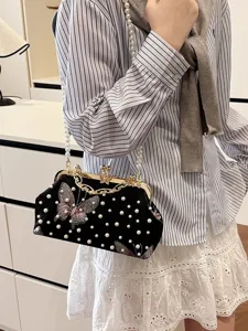 Bolso de noche elegante de terciopelo negro vintage con perlas y bordado de mariposa