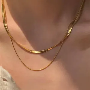 Double-layered gold snake chain necklace for women featuring a vintage layered style