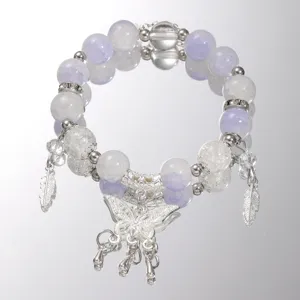 Elegant lavender glass beaded bracelet featuring a butterfly charm and silver feather accents.