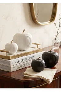 Modern minimalist ceramic apple ornaments with ribbed texture and gold stems for home decor