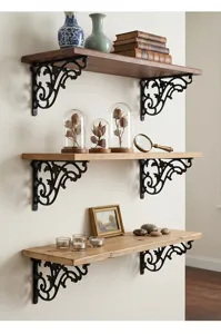 Detail of vintage black cast iron shelf brackets with elegant scroll design for home decor