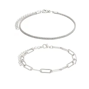Set of two silver-colored anklets featuring a paperclip link and textured popcorn chain