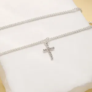 Exquisite silver sparkling cross pendant anklet detail showing delicate craft for women