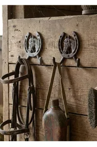 Antike Hufeisen-Wandhaken aus Gusseisen mit einem detaillierten Pferdekopf-Design