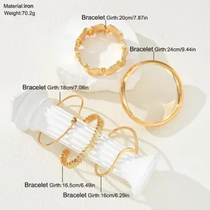 Detailed view of five gold-colored stackable bracelets with exact girth measurements in cm.
