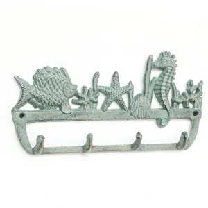 Mediterraner Gusseisen-Wandhaken im Vintage-Stil mit Seepferdchen- und Fischdesign.