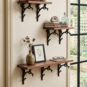 Staffe da parete creative in ghisa a forma di ramo d'albero per mensole decorative