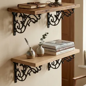 Vintage European style black cast iron shelf brackets with ornate scrollwork design