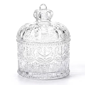 Vintage embossed transparent glass jewelry box with crown lid and elegant decorative patterns