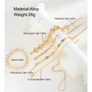 Vista detallada del conjunto de pulseras de oro con conchas y perlas con medidas