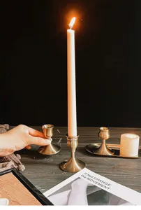 Detailed view of brass aluminum candle holders for vintage Nordic home decor and romantic dinner