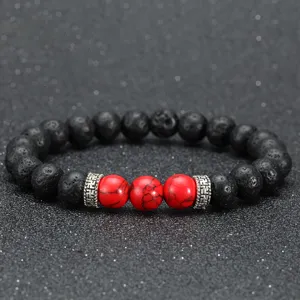 Bracelet en pierre de lave naturelle et perles rouges avec entretoise pour bijoux yoga.