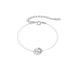 Delicate single stone transparent fishing line bracelet detail, elegant S925 silver jewelry.