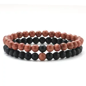 Set of 2 men's beaded bracelets featuring 6mm brown goldstone and black matte stone beads.