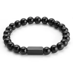Classico bracciale di perle nere per uomo e donna con elegante elemento centrale.