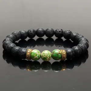 Lava stone and green imperial jasper bracelet with golden swastika spacer beads for yoga.