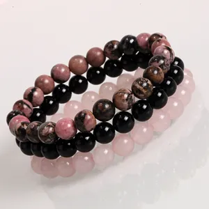 Mehrlagiges Perlenarmband-Set mit schwarzen, rosa und Rosenquarz-Perlen für Yoga-Damen ideal.