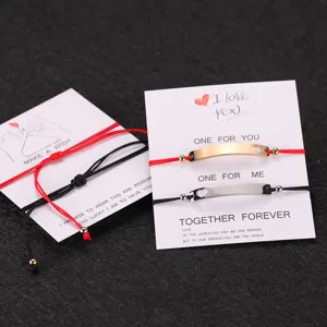 Pulseras de pareja DIY hechas a mano de acero inoxidable con dijes de corazón y cordones.