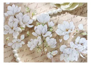 Close-up of PET tape with iridescent shell-light floral patterns for scrapbooking