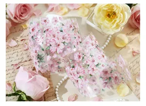 Macro detail of cherry blossom PET tape with delicate shell luster finish for journal