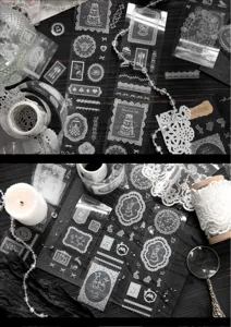 Close-up detail of white lace PET stickers with vintage rose patterns for DIY journaling