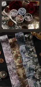 Macro view of vintage gothic floral and butterfly decorative tapes for journaling.
