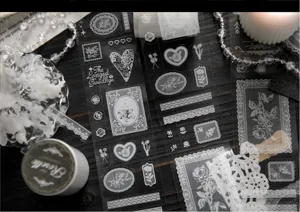 Detailed macro view of white lace rose PET stickers for scrapbooking and DIY decoration