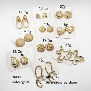 Selection of chunky gold alloy stud earrings in various geometric shapes with weights