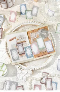 Detail view of vintage lace frame stickers for aesthetic DIY journaling and scrapbooking